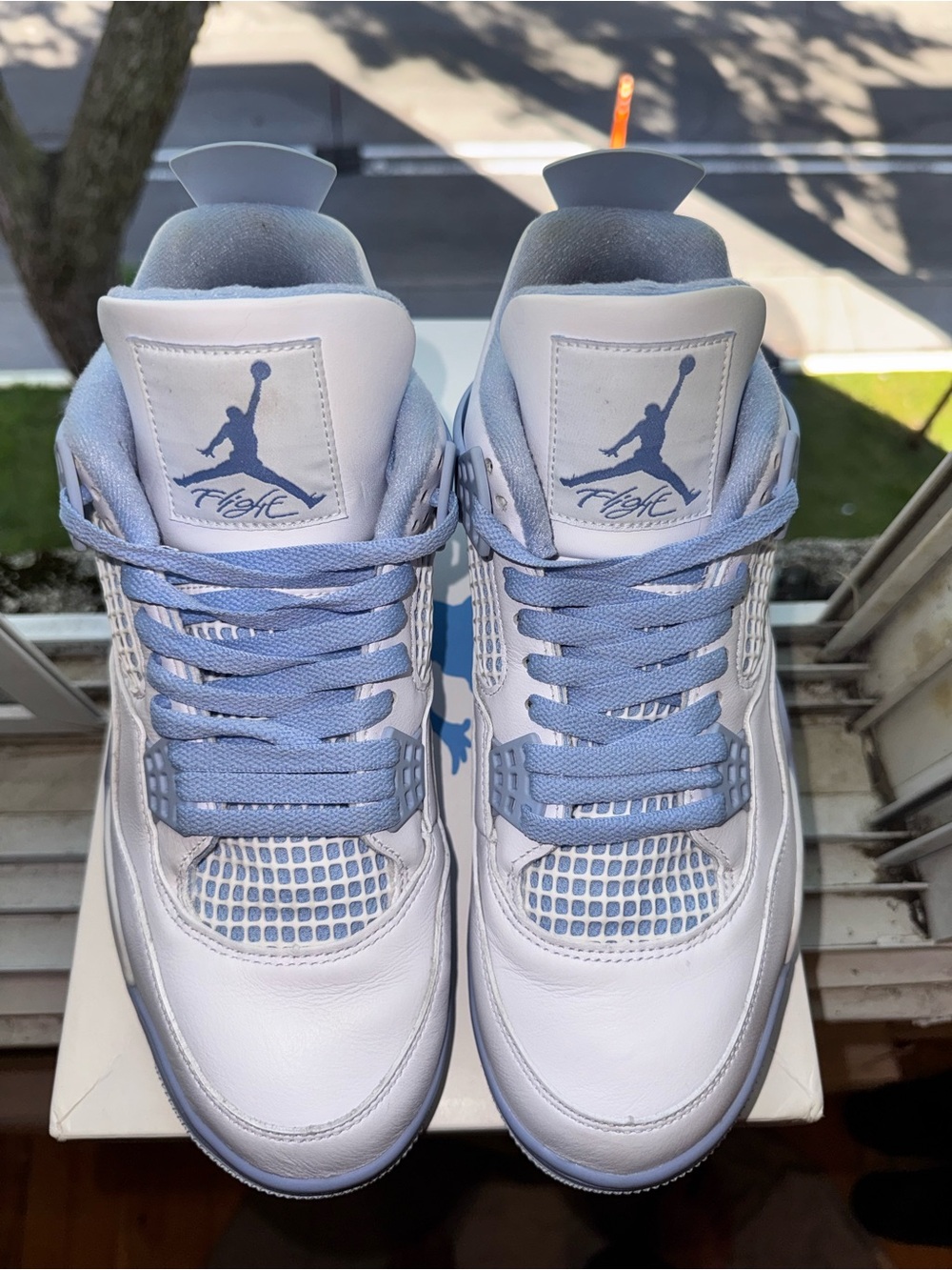 Jordan 4 Retro in White and Light Blue